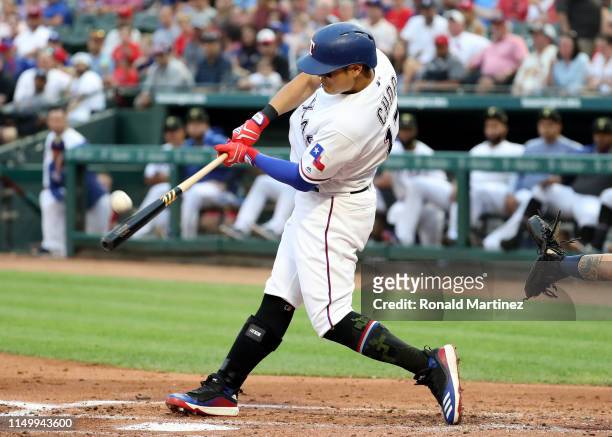 Shin-Soo Choo of the Texas Rangers hits a two-run homerun against the St. Louis Cardinals in the second inning at Globe Life Park in Arlington on May...