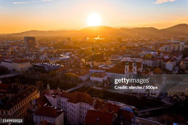 graz city center aerial sunset view - graz stock pictures, royalty-free photos & images