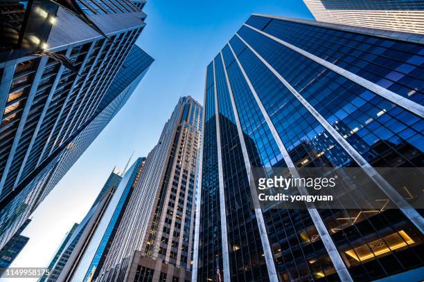 modern skyscrapers in midtown manhattan - building exterior stock pictures, royalty-free photos & images