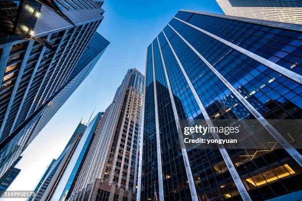 modern skyscrapers in midtown manhattan - bank stock pictures, royalty-free photos & images