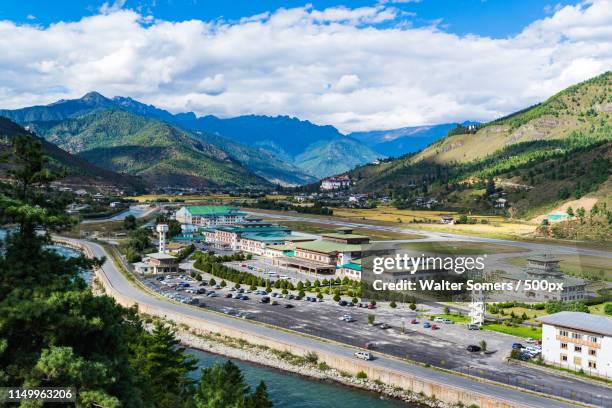 paro airport - paro valley stock pictures, royalty-free photos & images