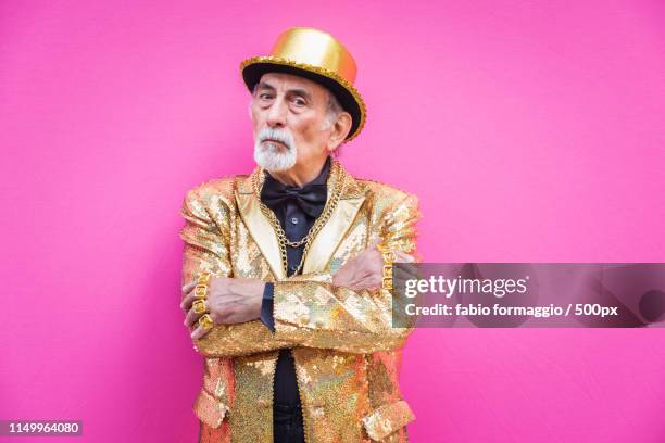 eccentric senior man portrait - sequin suit stock pictures, royalty-free photos & images