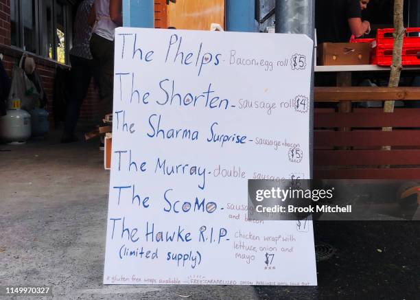 Sign advertising the cost of sausages and bread at Bronte Beach Primary School on May 18, 2019 in Sydney, Australia. Australians head to the polls...