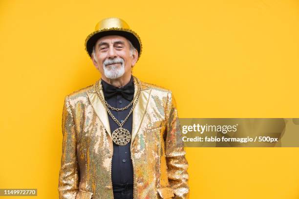 eccentric senior man portrait - guldfärgad blazer bildbanksfoton och bilder