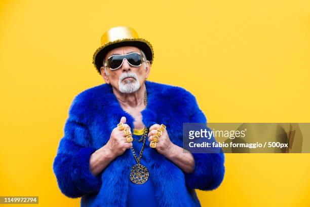 eccentric senior man portrait - rapper chain stock pictures, royalty-free photos & images