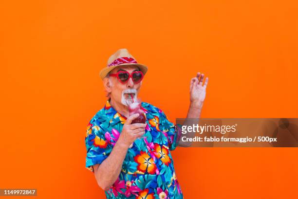 eccentric senior man portrait - pop musician stock pictures, royalty-free photos & images