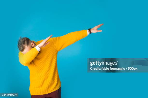 happy man portrait - dab dance stock pictures, royalty-free photos & images