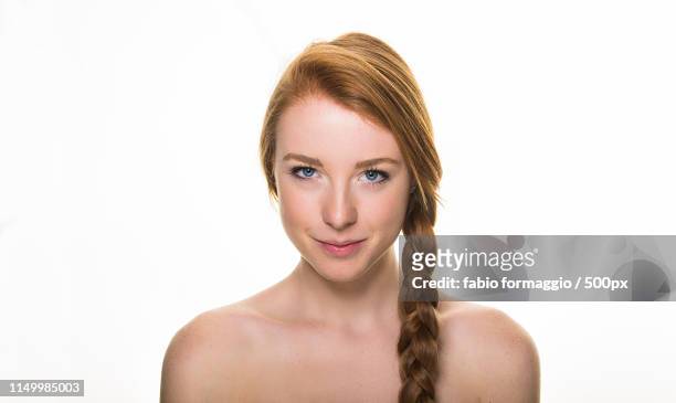 beautiful woman posing in studio - light skin black woman stockfoto's en -beelden