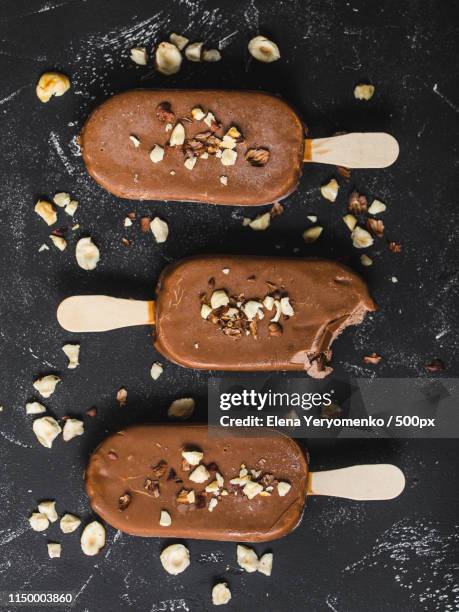 chocolate ice cream popsicles - frost bite stock-fotos und bilder