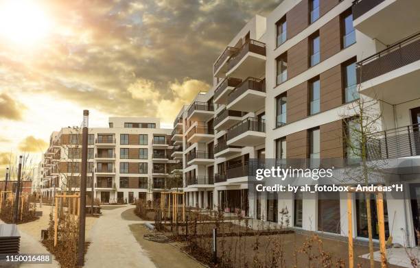 cityscape with facade of a modern residential building - housing development rendering stock pictures, royalty-free photos & images