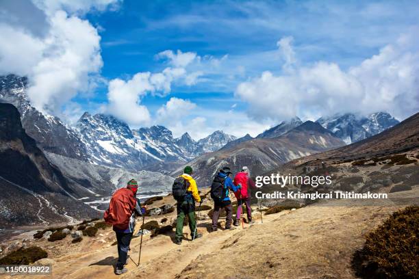 walking to everest base camp. - nepal mountains stock pictures, royalty-free photos & images