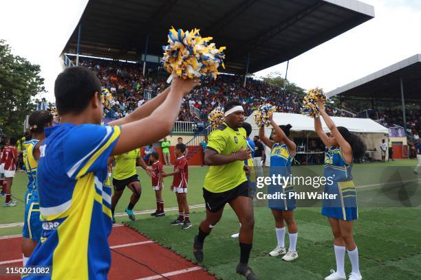 Fijian Latui run onto the field during The Rapid Rugby match between Fijian Latui and Kagifa Samoa at Churchill Park on May 18, 2019 in Nadi, Fiji.