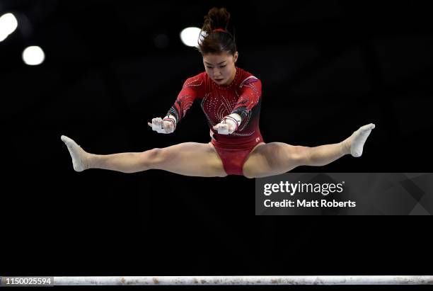 Asuka Teramoto of Japan competes on the Uneven Bars during day one of the Artistic Gymnastics NHK Trophy at Musashino Forest Sport Plaza on May 18,...