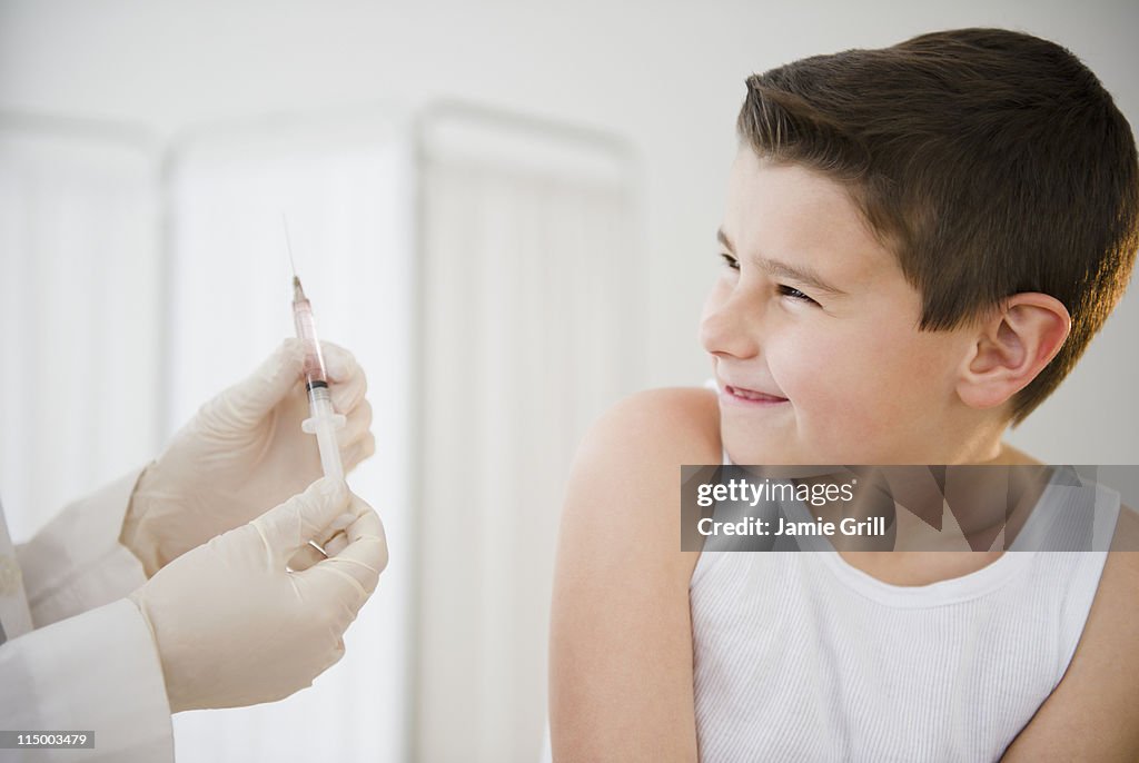 Young boy afraid before injection