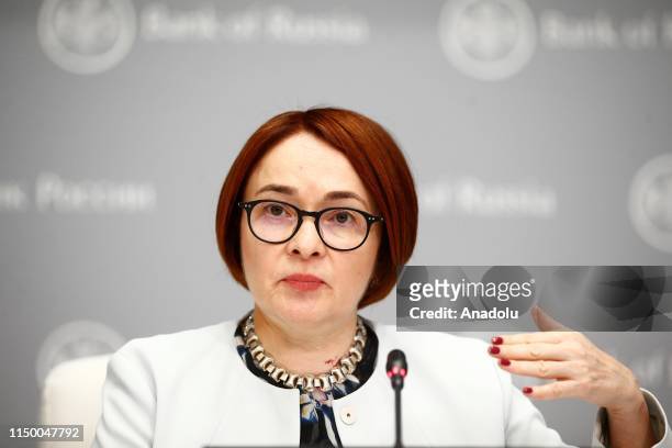 Russian Central Bank Governor Elvira Nabiullina makes a speech as she holds a press conference to declare for cutting the interest rate in Moscow,...