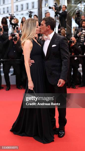 Antonio Banderas and Nicole Kimpel kiss prior to the screening of "Pain And Glory " during the 72nd annual Cannes Film Festival on May 17, 2019 in...