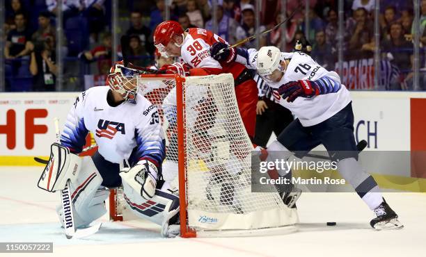 Morten Poulsen of Denmark challenges Brady Skjei of United States during the 2019 IIHF Ice Hockey World Championship Slovakia group A game between...