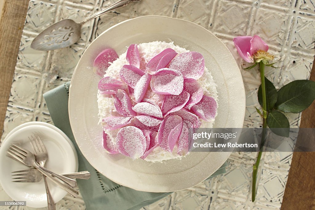 Coconut cake with rose petals