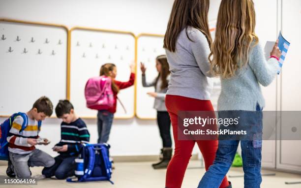 group of children at school - welcome back to school stock pictures, royalty-free photos & images