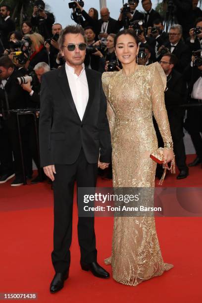Jean-Michel Jarre and Gong Li attend the screening of "Pain And Glory " during the 72nd annual Cannes Film Festival on May 17, 2019 in Cannes, France.