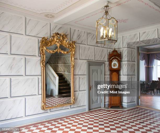 elegant manor hallway - grandfather clock stock pictures, royalty-free photos & images