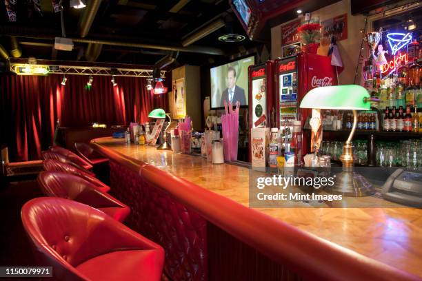 bar at an american style diner - vintage restaurant interior stock pictures, royalty-free photos & images
