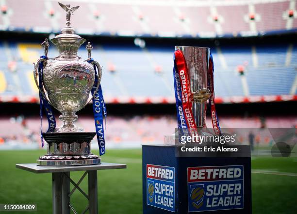 Coral Challenge Cup and Betfred Super League trophies are presented on the pitch ahead of the Betfred Super League match at Camp Nou on May 18, 2019...