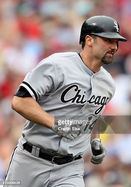 Paul Konerko of the Chicago White Sox rounds first after he hit a two run home run in the ninth inning against the Boston Red Sox on June 1, 2011 at...