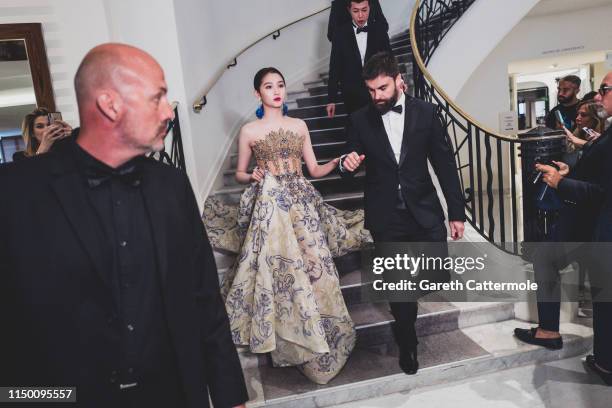 Guan Xiaotong leaves the Martinez Hotel during the 72nd annual Cannes Film Festival on May 17, 2019 in Cannes, France.