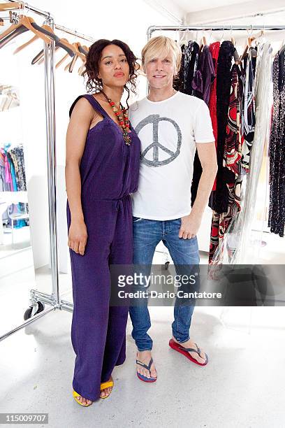 Designer Marc Bouwer and Star of "Viva Riva" movie Manie Malone attend a fitting at Marc Bouwer on June 1, 2011 in New York City.