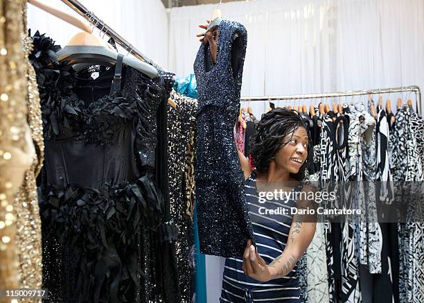 Founder of the new African Empower Suzanne "Africa" Engo attends a fitting at Marc Bouwer on June 1, 2011 in New York City.