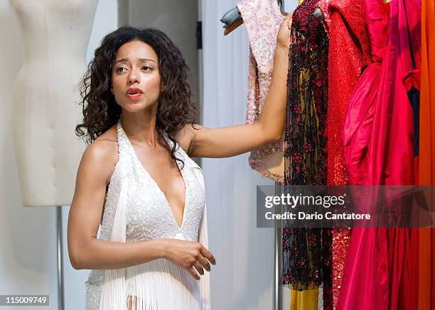 Star of "Viva Riva" movie Manie Malone attends a fitting at Marc Bouwer on June 1, 2011 in New York City.