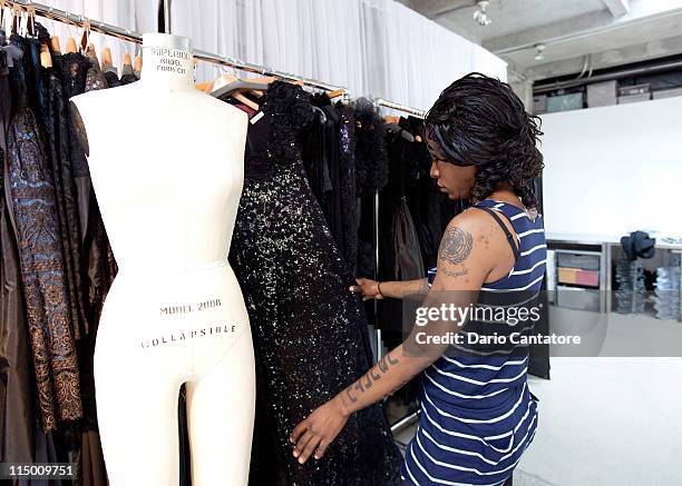 Founder of the new African Empower Suzanne "Africa" Engo attends a fitting at Marc Bouwer on June 1, 2011 in New York City.