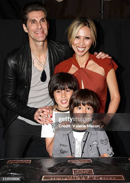 Singer Perry Farrell, wife Etty Lau and sons Hezron Wolfgang and Izzadore Bravo attend the induction of Jane's Addiction into Hollywood's Rockwalk at...