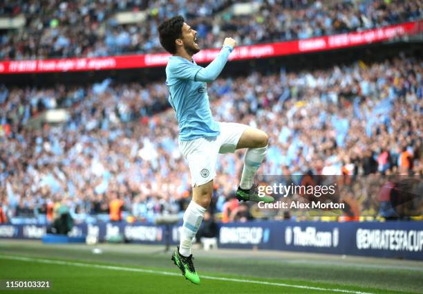 David Silva of Manchester City celebrates after scoring his team's first goal during the FA Cup Final match between Manchester City and Watford at...