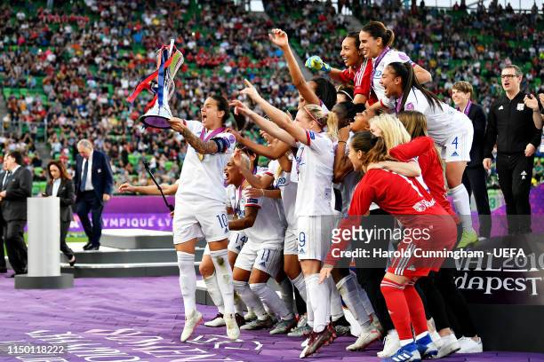 Dzsenifer Marozsan of Olympique Lyonnais Women lifts the trophy with her team after winning the UEFA Women's Champions League Final between Olympique...