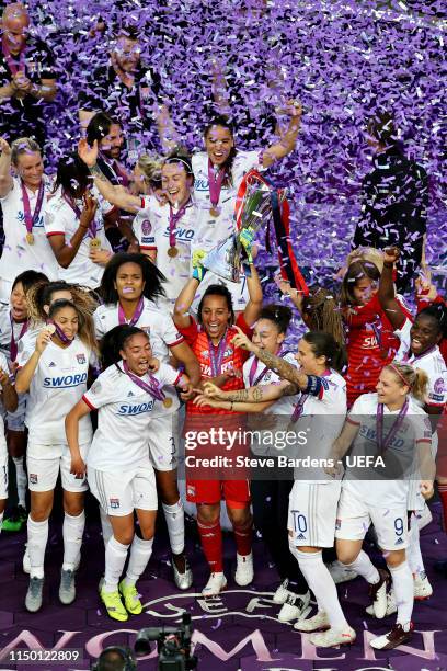 The Olympique Lyonnais Women team celebrate with the trophy after winning the UEFA Women's Champions League Final between Olympique Lyonnais Women...