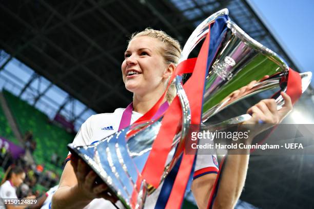 Hattrick hero Ada Hegerberg of Olympique Lyonnais Women celebrates after winning the UEFA Women's Champions League Final between Olympique Lyonnais...