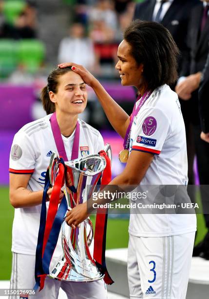 Dzsenifer Marozsan of Olympique Lyonnais Women and teammate Wendie Renard celebrate after the UEFA Women's Champions League Final between Olympique...