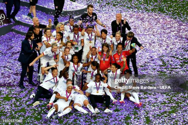 The Olympique Lyonnais Women team celebrate with the trophy after winning the UEFA Women's Champions League Final between Olympique Lyonnais Women...