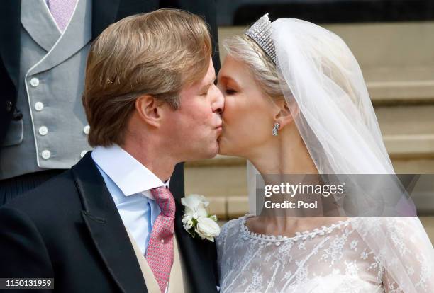 Thomas Kingston and Lady Gabriella Windsor kiss as they leave St George's Chapel after their wedding on May 18, 2019 in Windsor, England.