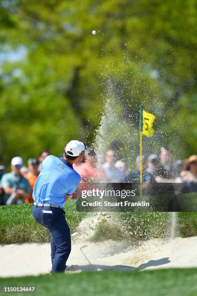 Danny Lee of New Zealand plays a shot from a bunker on the fifth hole during the third round of the 2019 PGA Championship at the Bethpage Black...