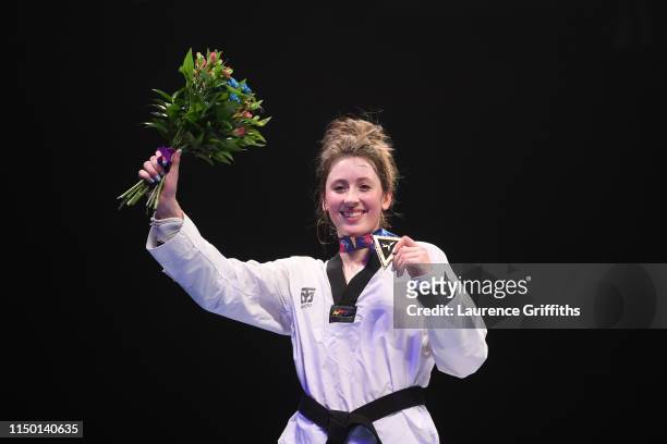Jade Jones of Great Britain celebrates with her gold medal after victory against Lee Ah-Reum of South Korea in the Final of the Women’s -57kg during...