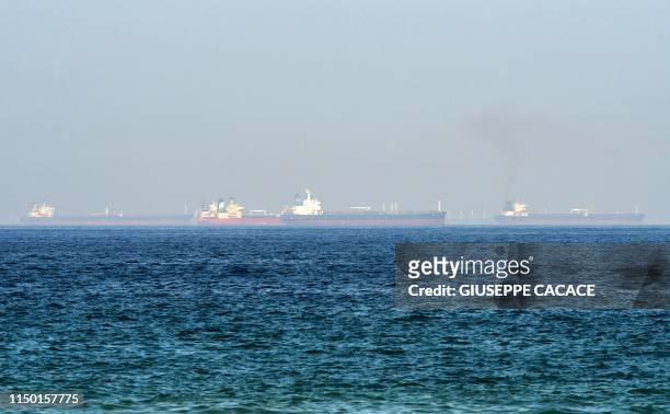 This picture taken on June 15, 2019 shows tanker ships in the waters of the Gulf of Oman off the coast of the eastern UAE emirate of Fujairah.