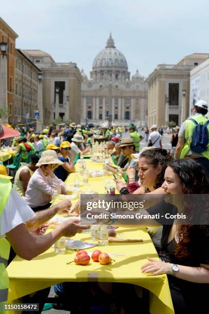 People partecipate at Italian Dinner without walls in Via della Conciliazione in front of St. Peter's Basilica, initiative co-sponsored by Focsiv,...