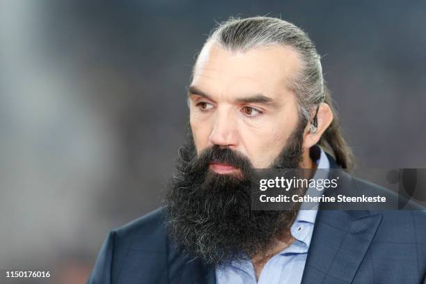 Sebastien Chabal French former rugby player is commentating during the Top 14 Final match between Toulouse and Clermont at Stade de France on June...