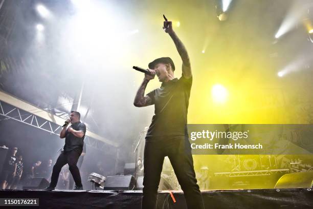 Singer Ken Casey and Al Barr of the American band Dropkick Murphys perform live on stage during a concert at the Zitadelle Spandau on June 15, 2019...