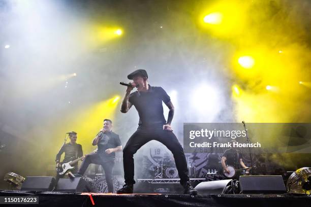 Singer Ken Casey and Al Barr of the American band Dropkick Murphys perform live on stage during a concert at the Zitadelle Spandau on June 15, 2019...