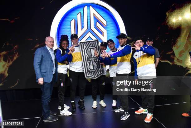 Managing Director Brendan Donohue awards Warriors Gaming Squad with the championship after The Ticket Tournament of the NBA 2K League on June 15,...