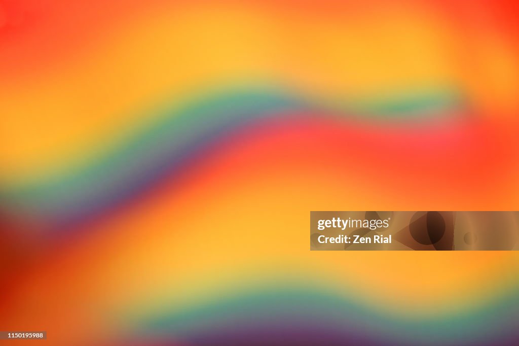 Defocused multicolored belt creating wave patterns